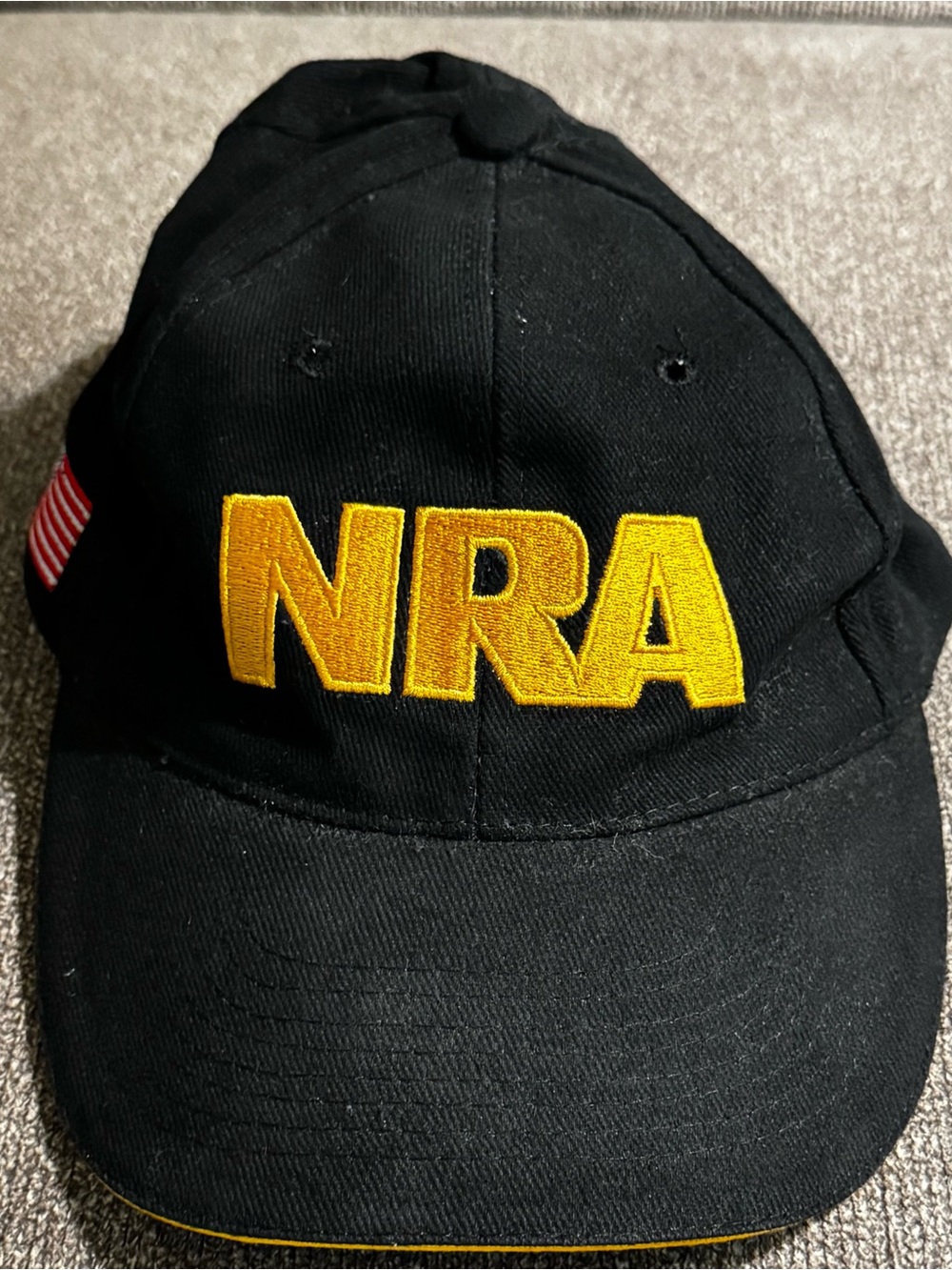 Black Hat with Bold Yellow NRA Embroidery American Flag